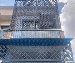 Khung sắt chuồng cọp bảo vệ mặt tiền nhà phố